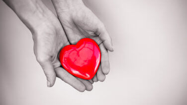 Hand holding beautiful heart