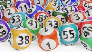 Colorful lottery balls on a white table